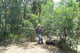 photo of Les clearing their new block